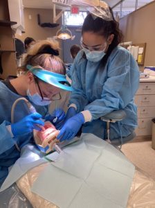 Dental student practicing skills