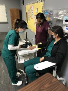 Phlebotomy Student practicing draw
